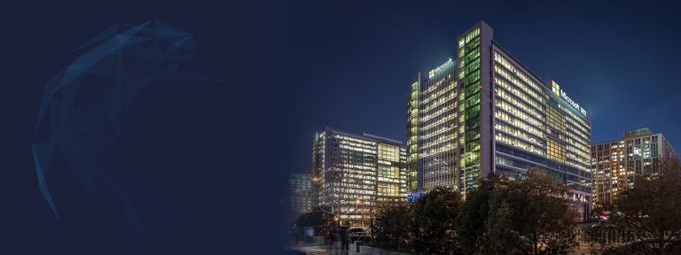 Microsoft Research Asia building illuminated at night